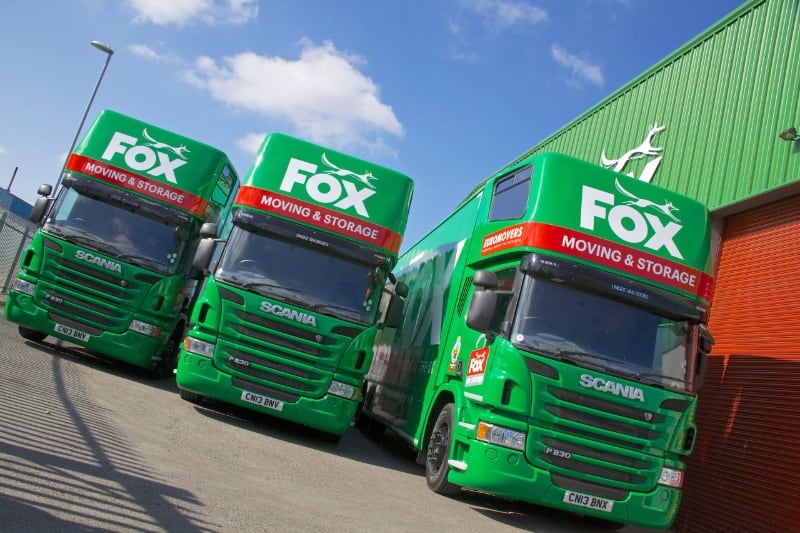 fox moving and storage vans outside a branch