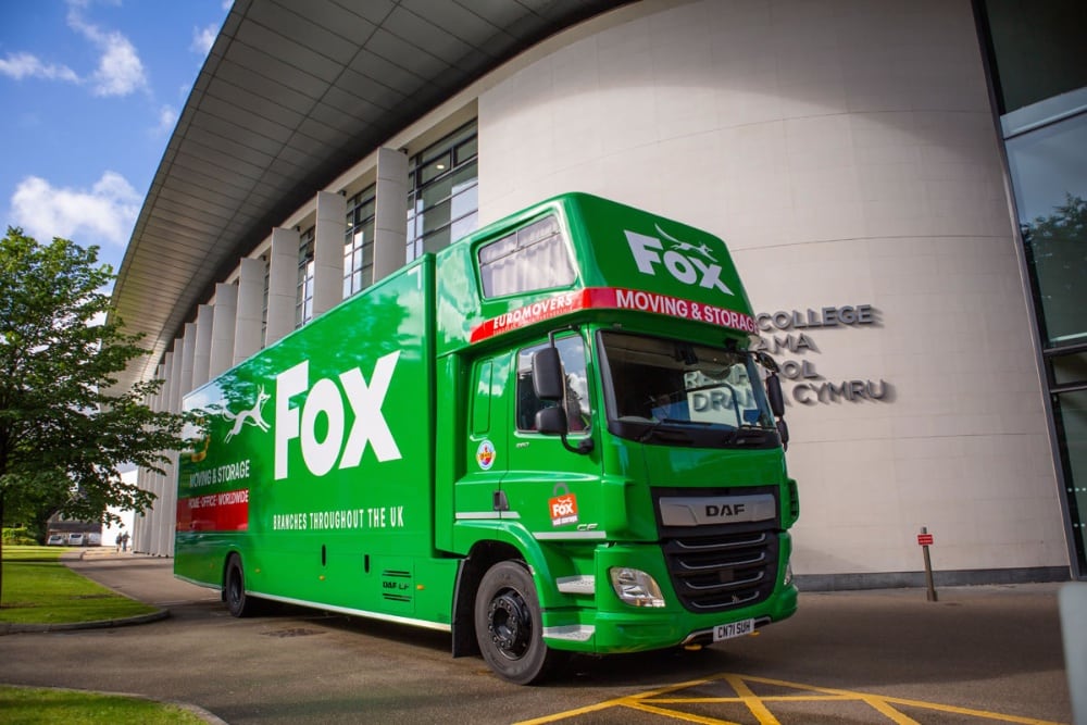 fox moving and storage van in front of the royal welsh college of music and drama