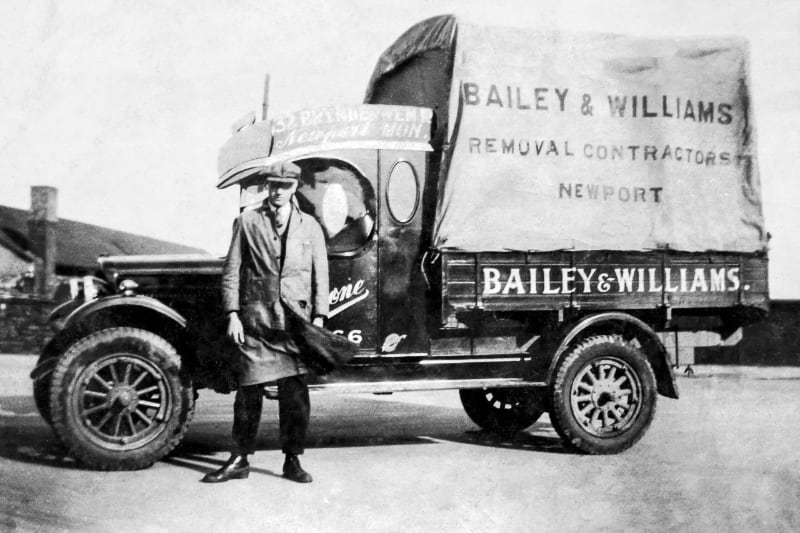 cecil bailey in front of a bailey and williams removals van in 1924